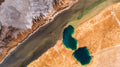 Two teal sinkholes in salt flats, fine art print