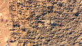 Stone ruins scattered in scrubland, fine art print