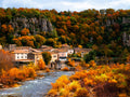 Riverside houses in autumn color, fine art print