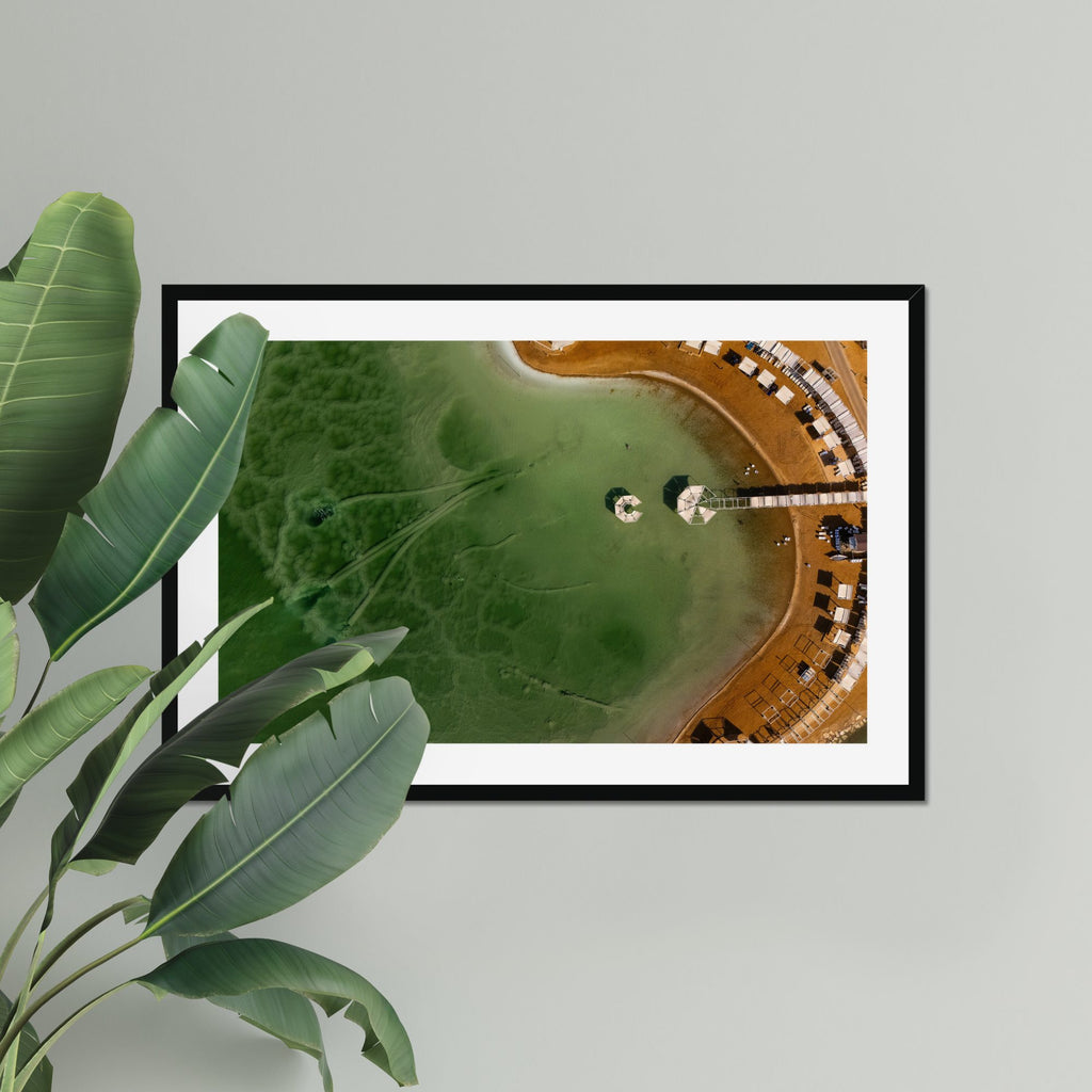 Lagoon Cabanas fine art print displayed in a living room