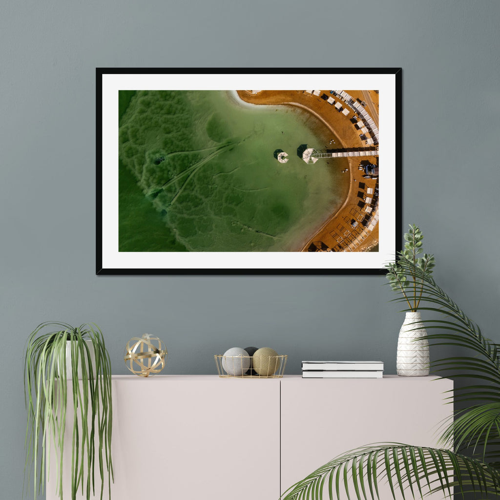 Lagoon Cabanas fine art print displayed in a living room