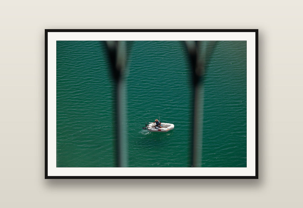 Small Boat, Big Sea fine art print mockup on a wall