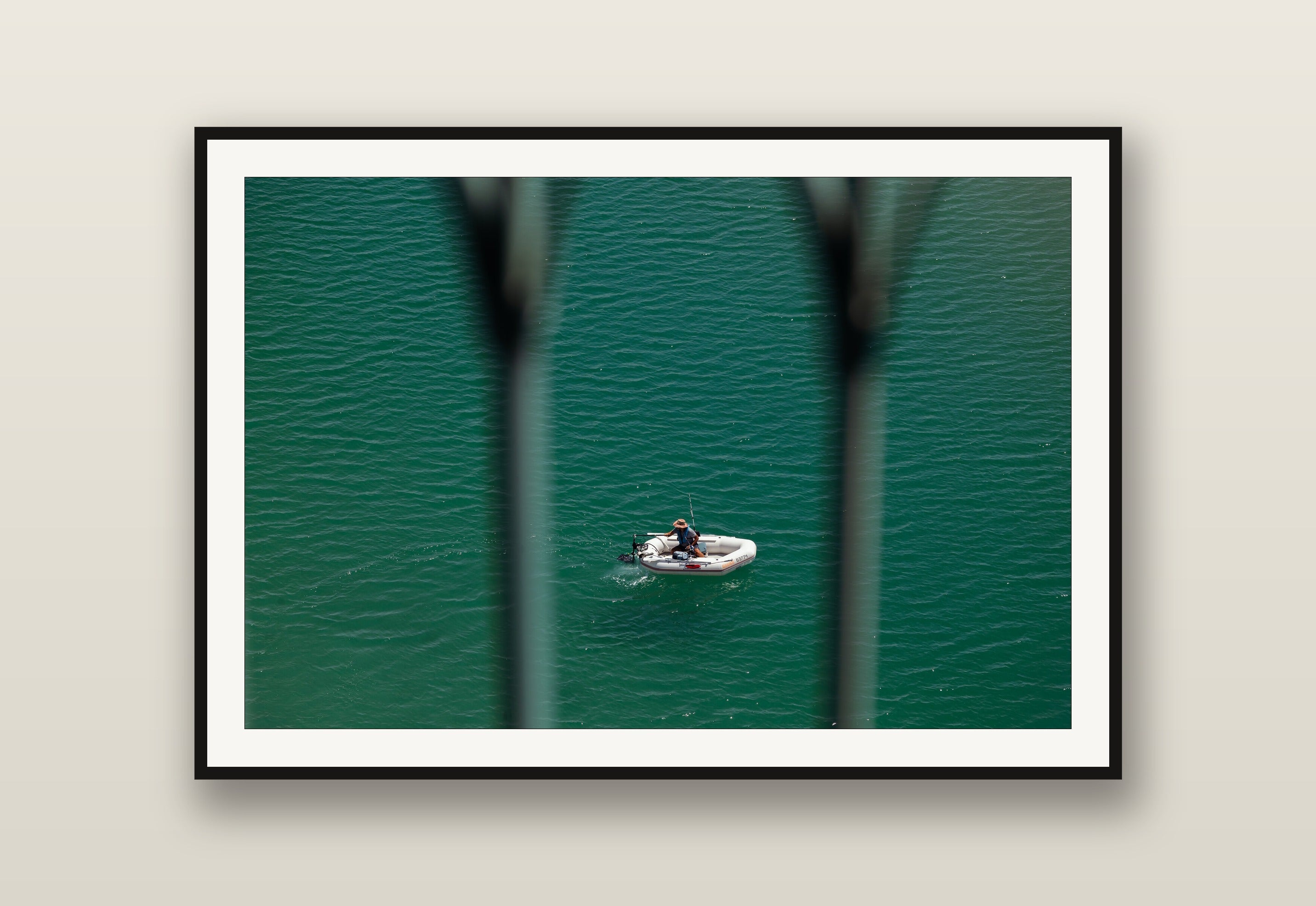 Small Boat, Big Sea fine art print mockup on a wall