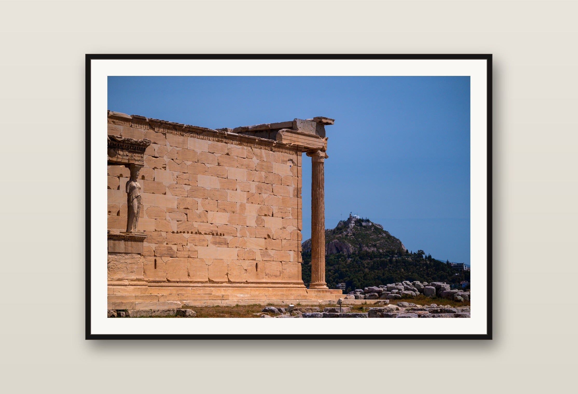 The Caryatids fine art print mockup on a wall